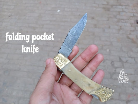 Folding Pocket Knife with bone and brass Handle.
