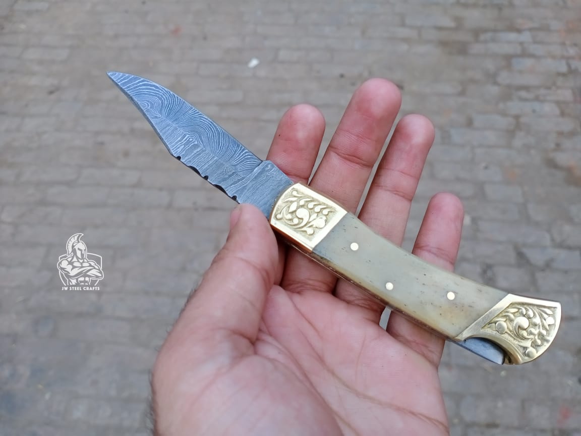 Folding Pocket Knife with bone and brass Handle.