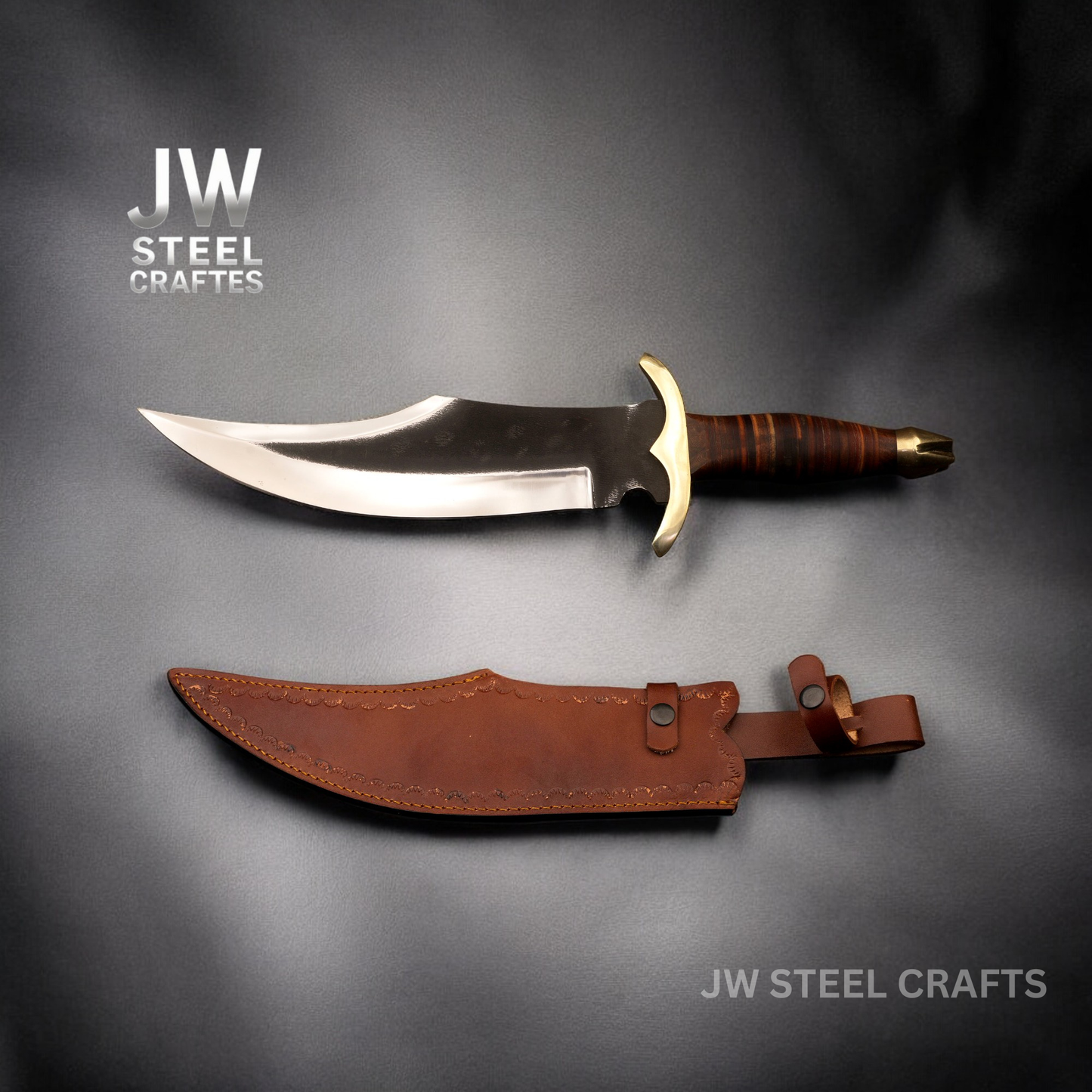 Knife with leather sheath on a gray background, branded 'JW Steel Crafts'.