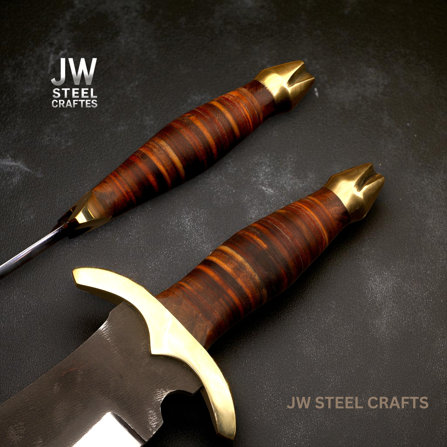Two ornate knives with wooden handles and gold accents on a dark surface, branded 'JW Steel Crafts'.