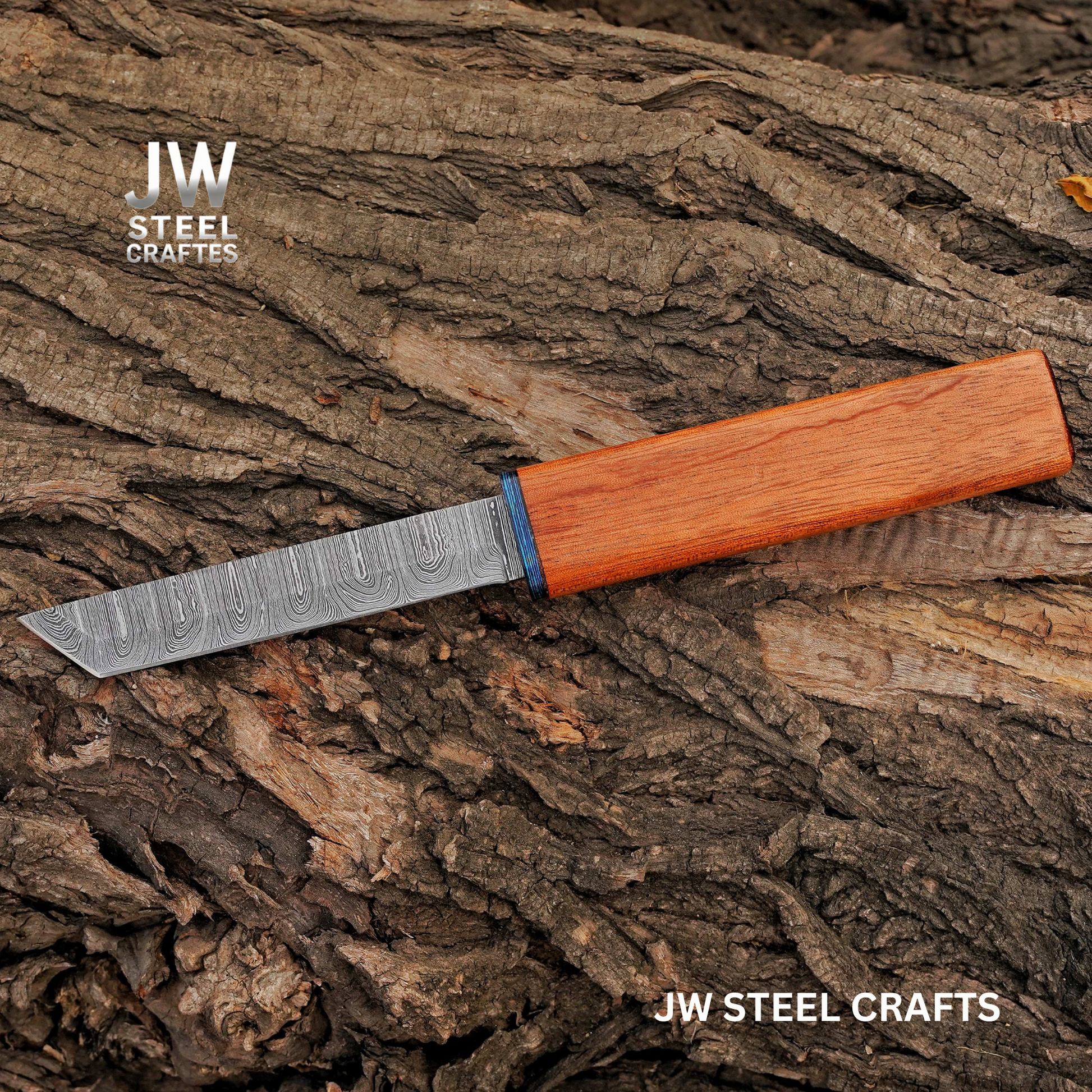 Knife with wooden handle on textured bark background, featuring JW Steel Crafts branding.