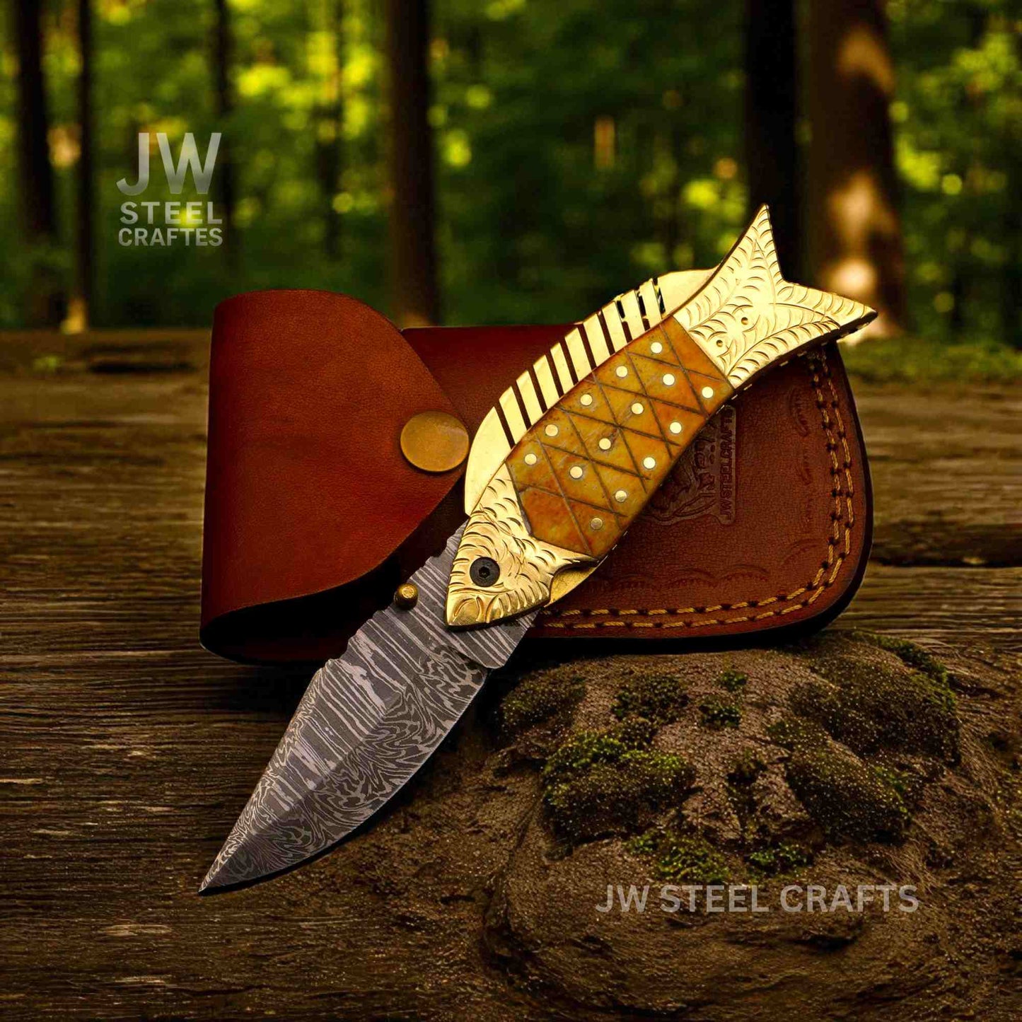 Decorative knife with wooden handle and leather sheath on a natural background, branded 'JW Steel Crafts'.