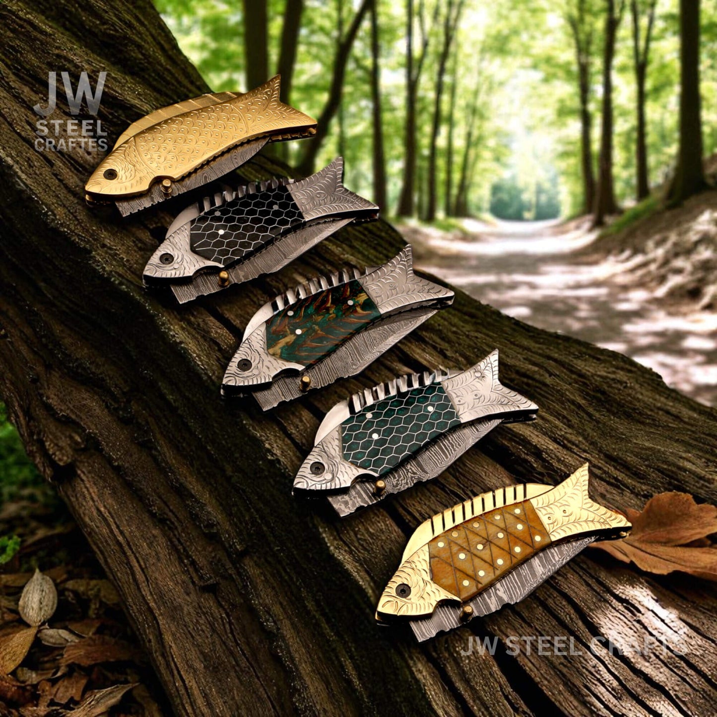 Five fish-shaped Damascus steel folding knives arranged on a tree trunk in a forest setting, showcasing black honeycomb, green honeycomb, green pinecone, natural bone with brass bolster, and full brass handle variations by JW SteelCrafts.