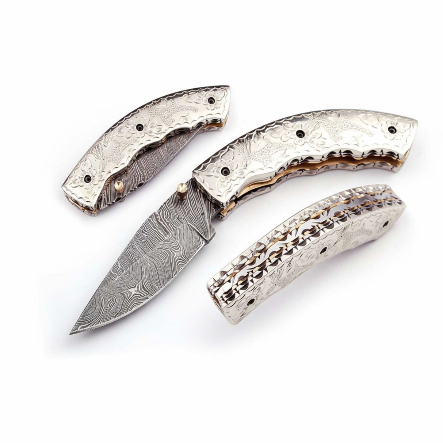 Handcrafted Damascus steel folding knife by JW SteelCrafts featuring an engraved silver handle, visible layered blade pattern, and precision-fit folding construction displayed on a clean white background.