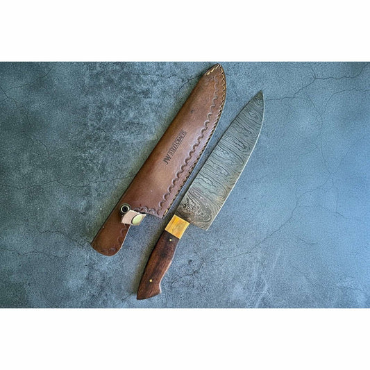 JW SteelCrafts handmade Damascus chef knife with wood handle brass bolster and leather sheath.