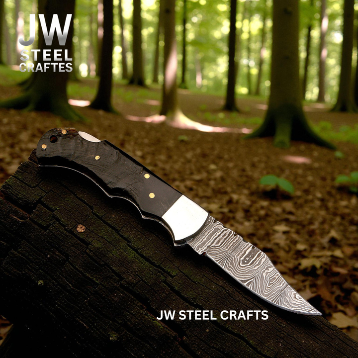 American Flag Damascus Folding Hunter with Ram Horn Handle