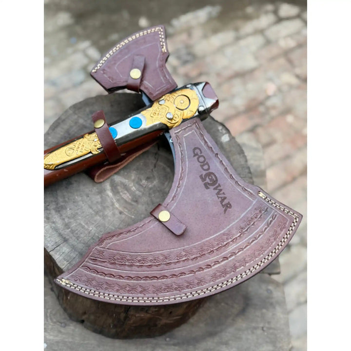 
Closeup of Norse-inspired fantasy engraving on dark steel double-bit axe head by JW SteelCrafts


