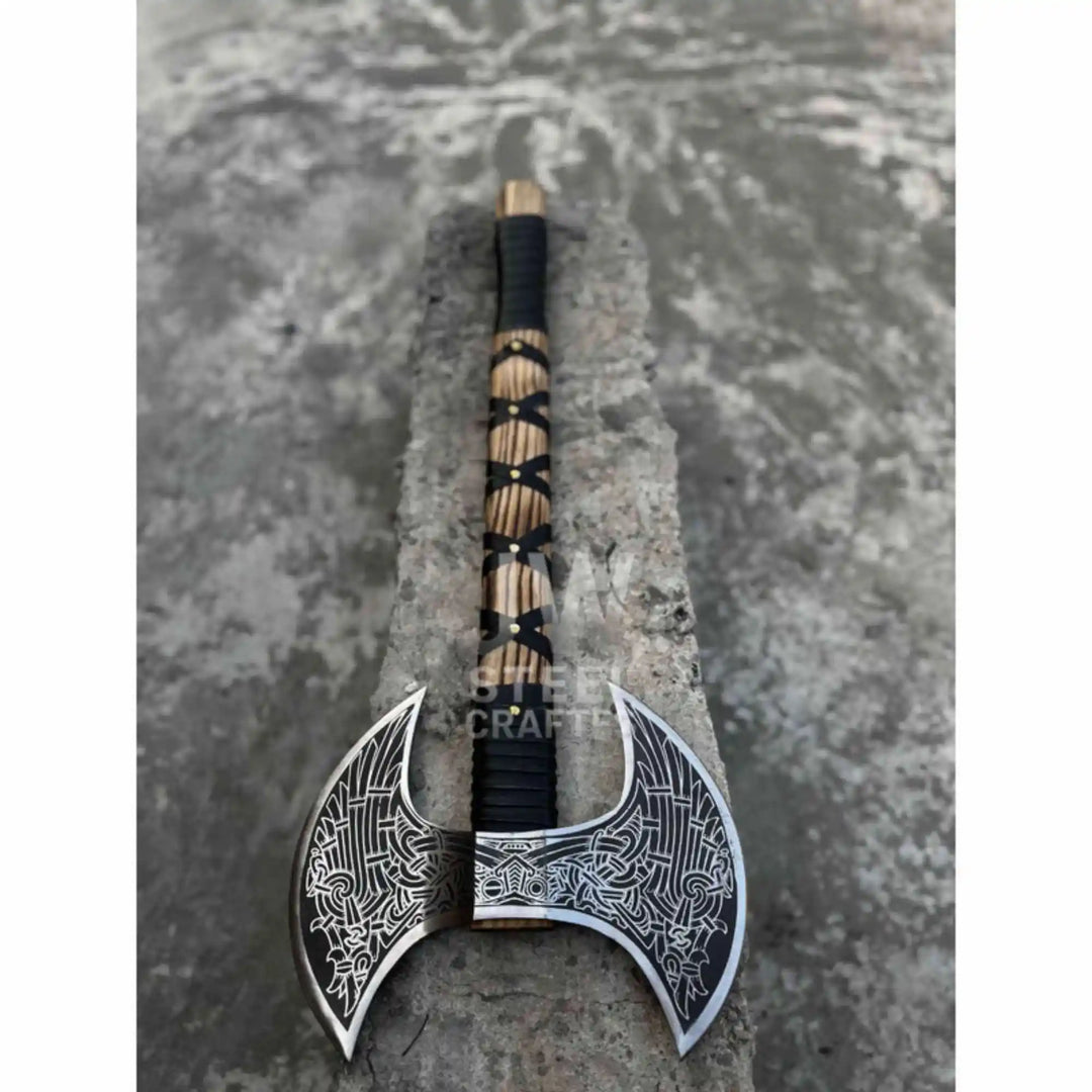 Hand engraved double headed Viking axe displayed on a roof