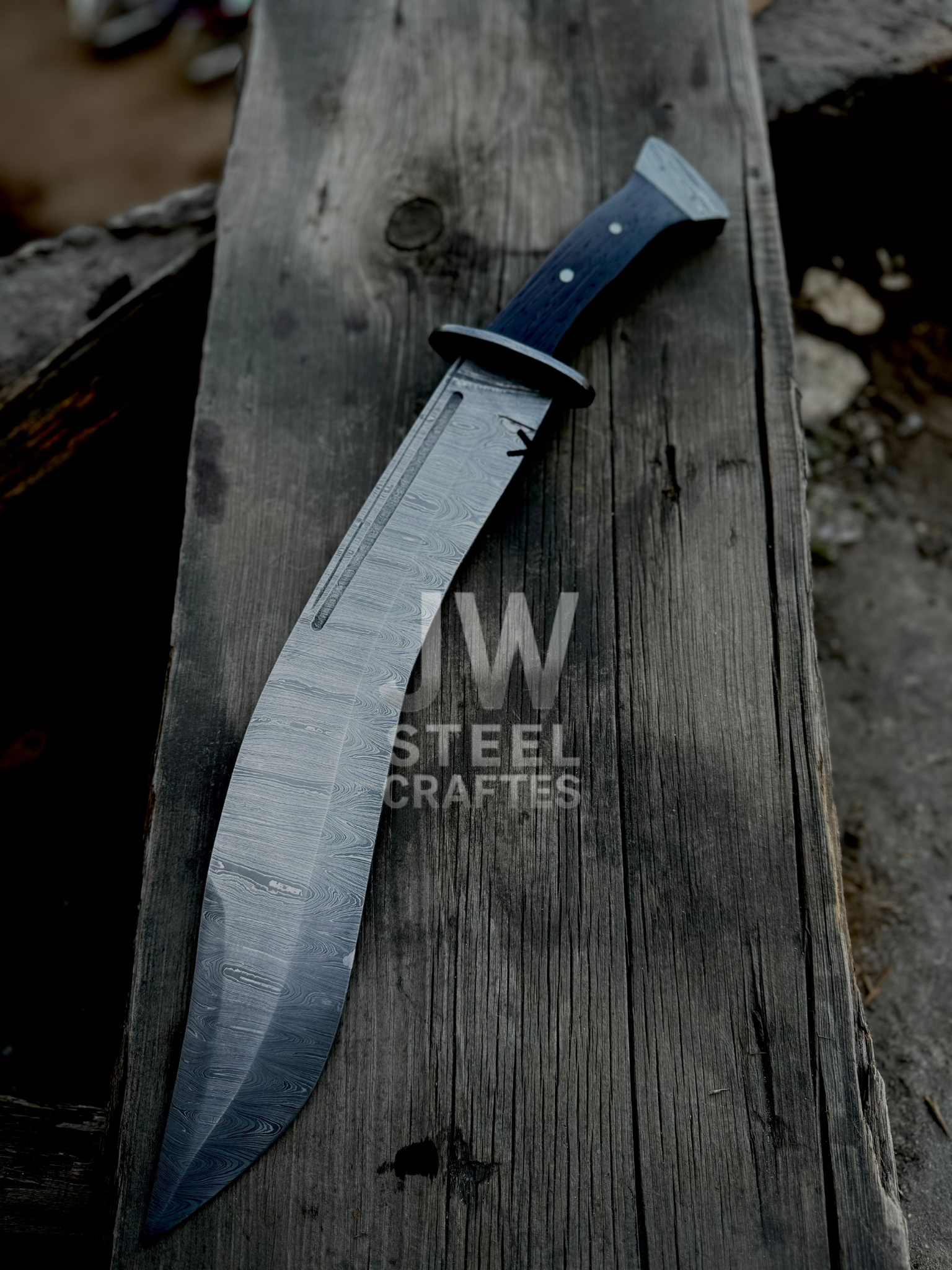 Custom Damascus hunting Bowie knife with ergonomic micarta handle, full tang blade, and leather sheath – perfect for collectors and outdoor use.