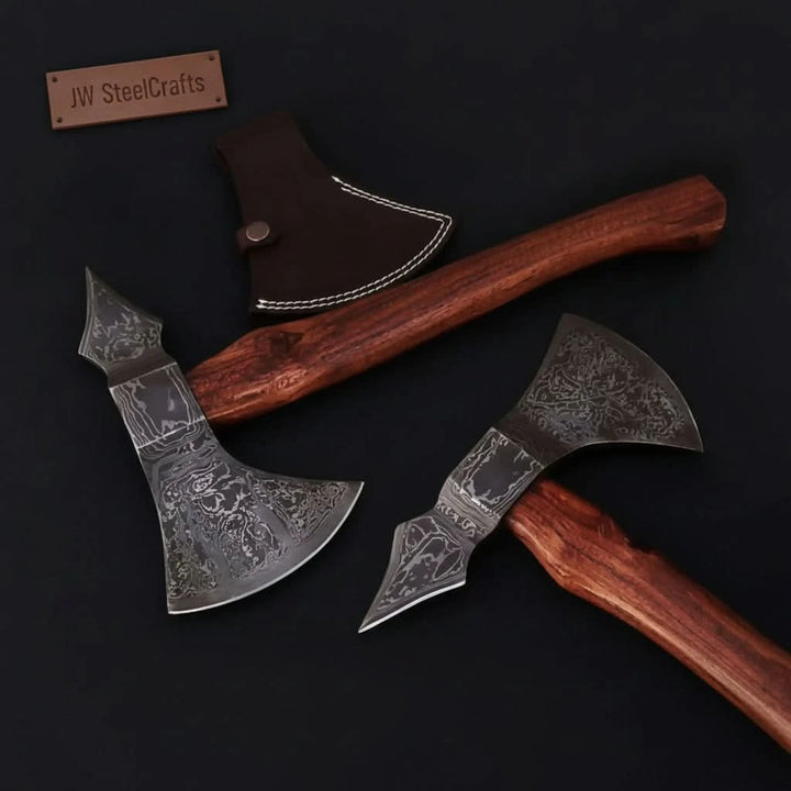     Custom Damascus warrior axe with decorative engravings and handcrafted curved wood handle