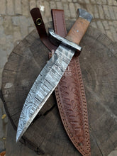 Load image into Gallery viewer, Hand-forged Damascus hunting knife with wooden handle and custom leather sheath