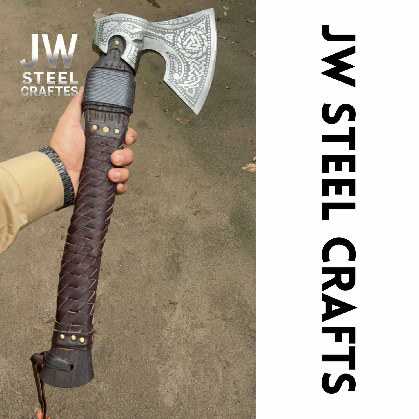Hand holding a decorative axe with braided handle, branded 'JW Steel Crafts'.