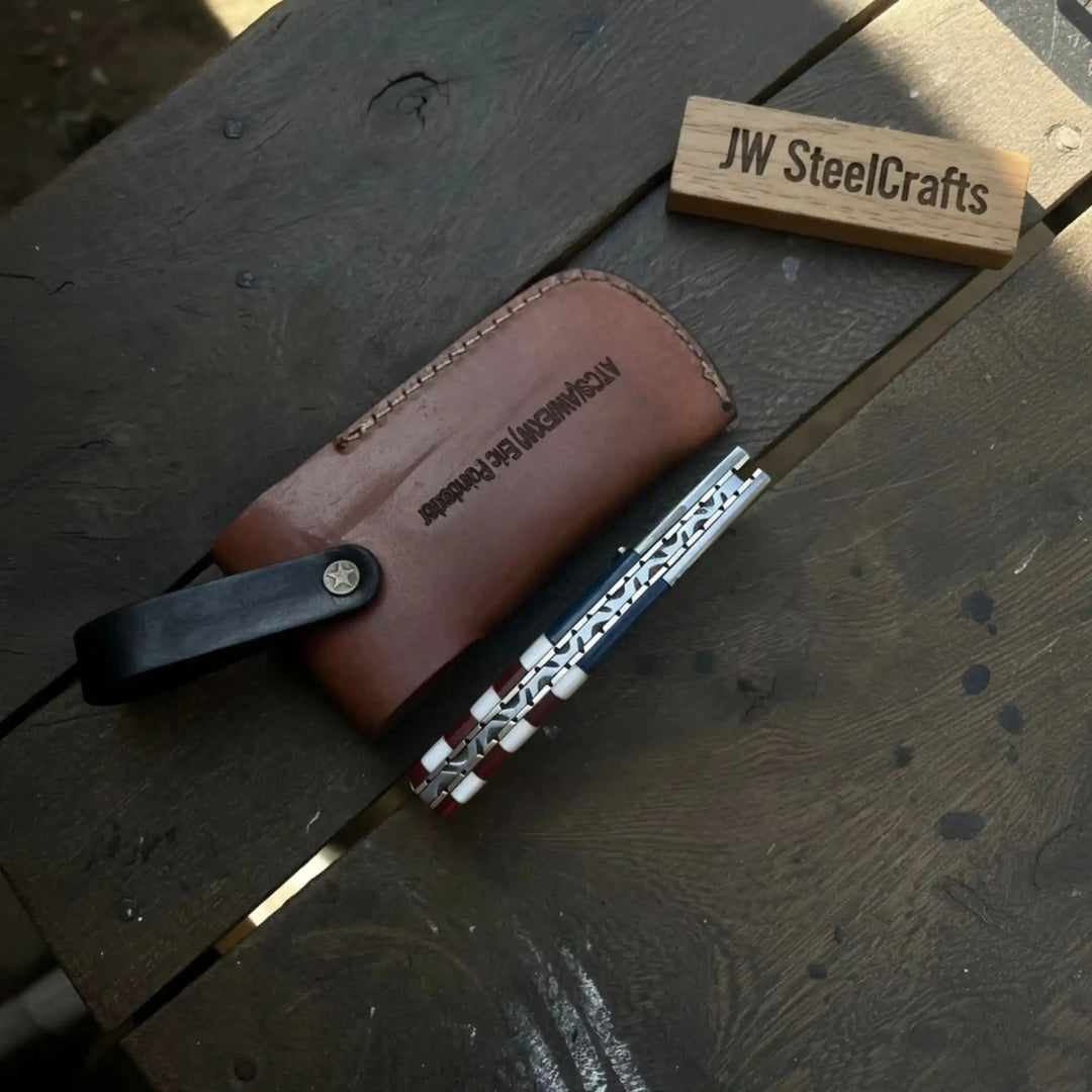 Damascus Folding Pocket Knife — American Flag Handle, Damascus Bolster, Linear Lock &amp; Hand Engraved Leather Sheath