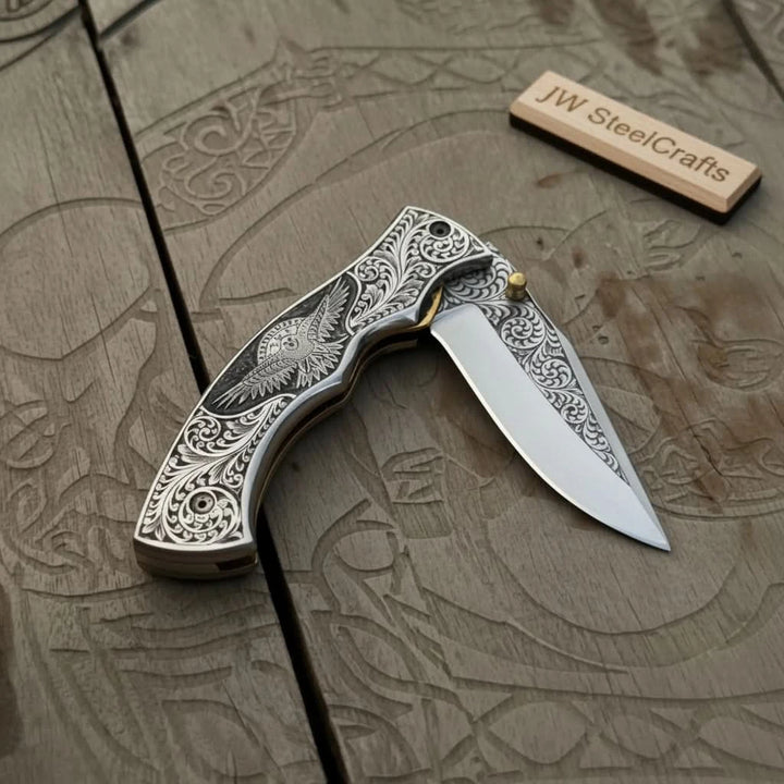 Hand Engraved Folding Knife — Eagle Motif Stainless Steel Scales, Mirror Polish Blade, Liner Lock, Wooden Box &amp; Viking Rune Bracelet