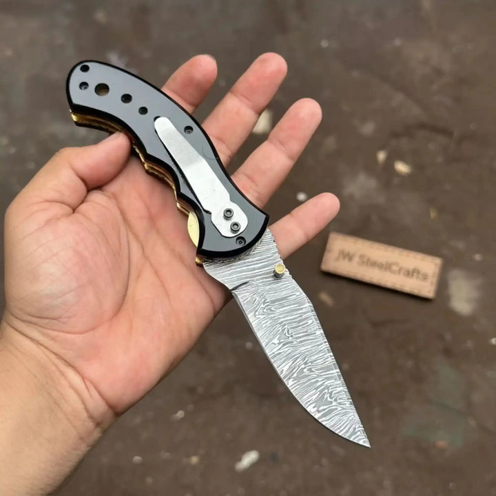Damascus Steel Folding Pocket Knife — Recurve Clip Point Blade, Black Resin Handle, Pocket Clip &amp; Cowhide Leather Sheath