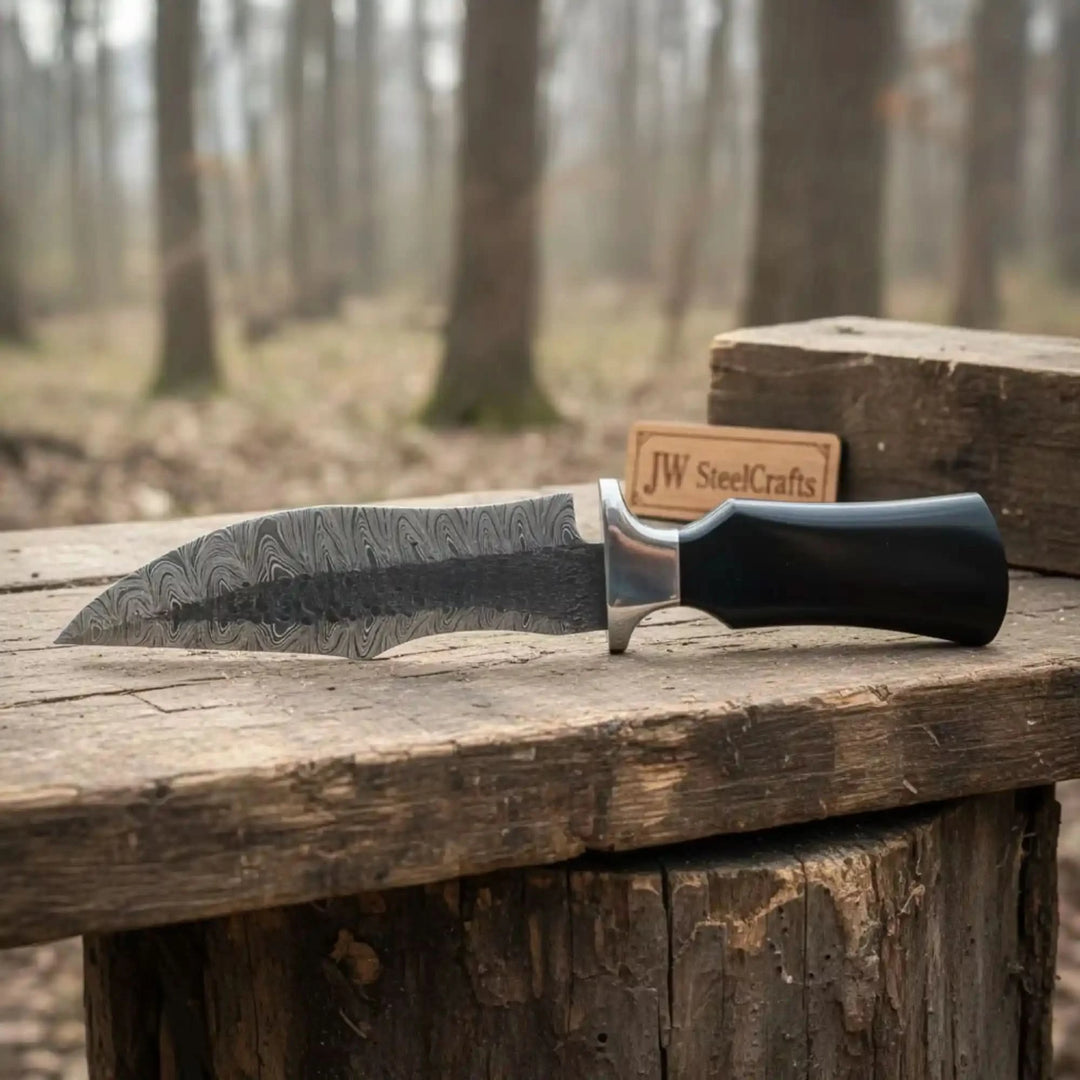 Damascus Trailing Point Fixed Blade Hunting Knife — Forged Ladder Pattern Blade, Black Resin Handle &amp; Steel Guard