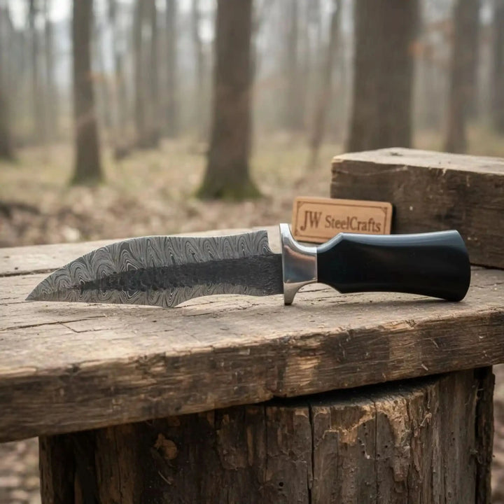 Damascus Trailing Point Fixed Blade Hunting Knife — Forged Ladder Pattern Blade, Black Resin Handle &amp; Steel Guard