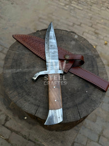 Hand-forged Damascus hunting knife with wooden handle and custom leather sheath