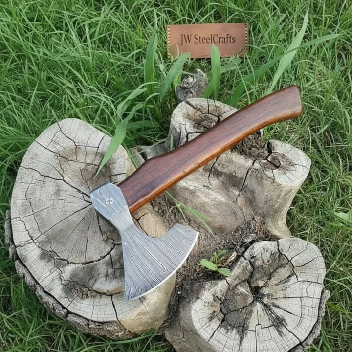     FrostClaw double-blade Damascus hatchet with polished wood handle and sheath.