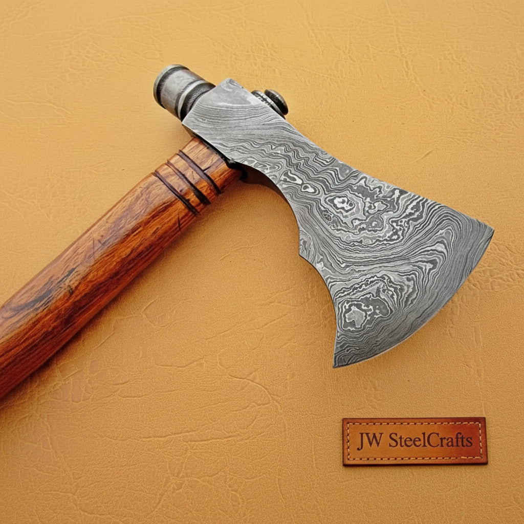     Stormpine custom Damascus forged axe showcasing detailed layered steel patterns and artisan wood craftsmanship.