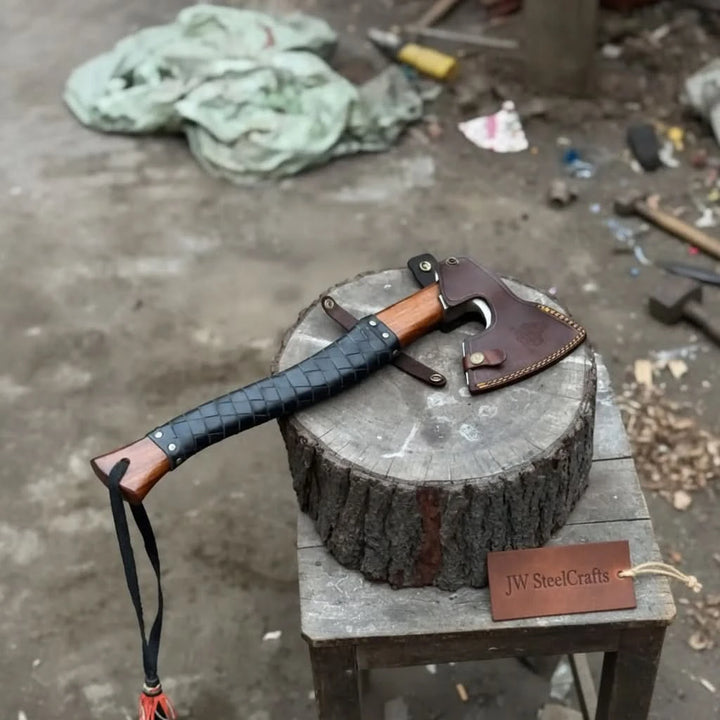 Brimveil-themed Norse battle axe featuring handcrafted wooden grip and stitched leather sheath outdoors.