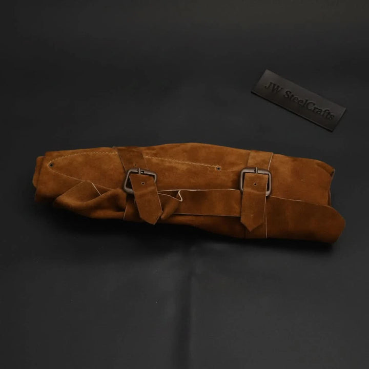 Vintage inspired suede knife carrying case emphasizing natural material finish and artisan stitched craftsmanship.