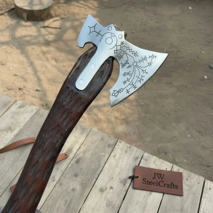 Carbon steel Viking double-bit axe side profile showing Norse rune etching on both sides of the hand forged steel head