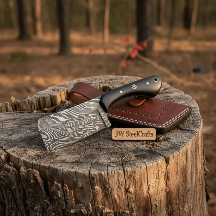 Polished edge Damascus cleaver case image showing black handle and leather sheath