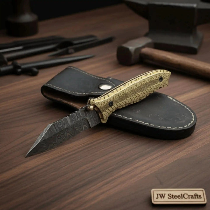     Ornamental Damascus pocket knife crafted with decorative metal scales and layered steel edge design