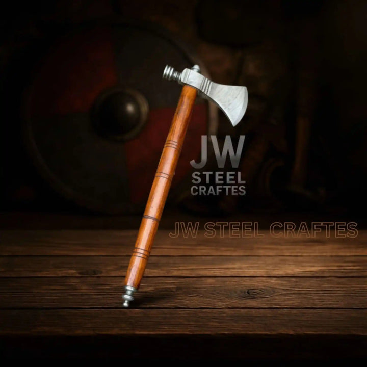 Agile Damascus handmade hatchet with sharp forged blade and ergonomic hardwood handle design.