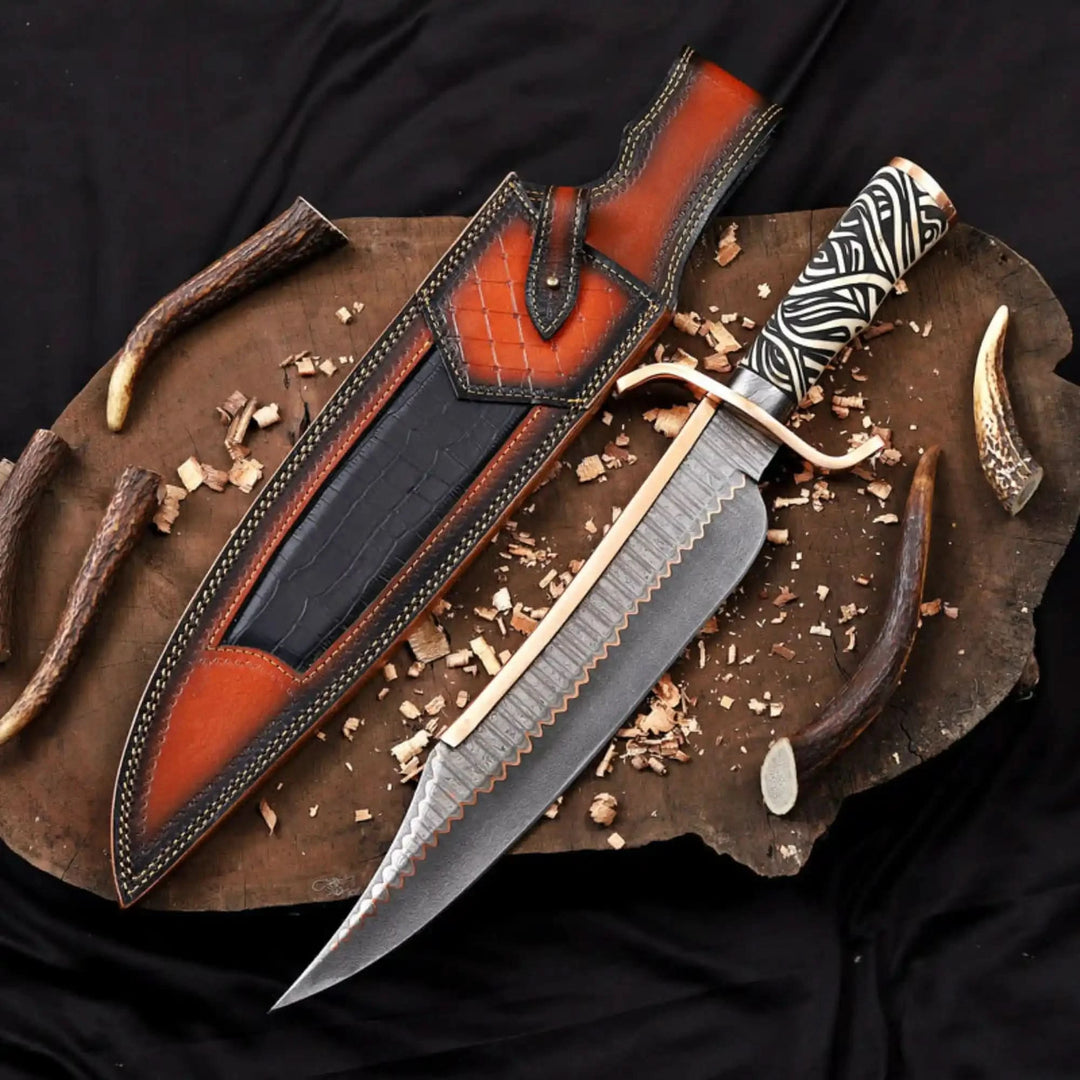 Serrated Damascus blade bowie knife with a bold zebra pattern handle and decorative crocodile-textured orange leather sheath