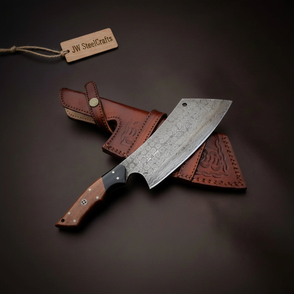 Heavy duty Damascus chopper knife with wood handle displayed beside a protective sheath