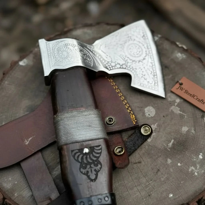 Yewfang-inspired Viking battle axe detail displaying ornate Nordic floral engravings and decorative steel craftsmanship.
