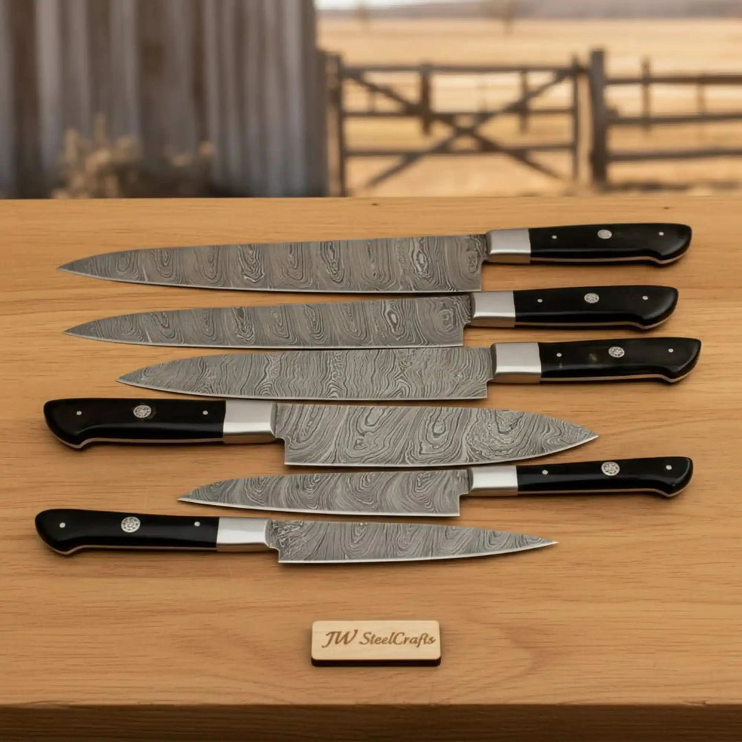 Damascus steel kitchen knives with polished grips and detailed layered blade textures.