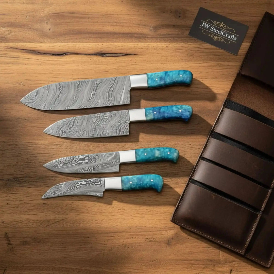 Damascus kitchen knives featuring razor-sharp patterned steel blades and turquoise resin grips.