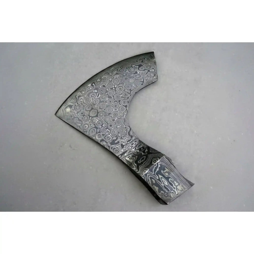     Premium Damascus bearded axe head showcasing bold layered steel artistry and curved design