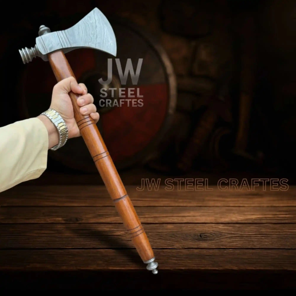 Elite Damascus Viking combat axe with intricate forged blade details and smooth handcrafted wood handle.