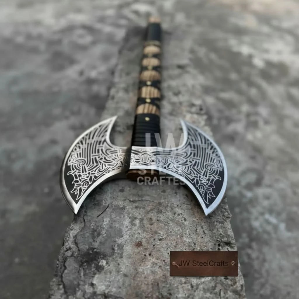 Dynamic Nordic hand axe display featuring engraved silver blade and dark leather-wrapped shaft.