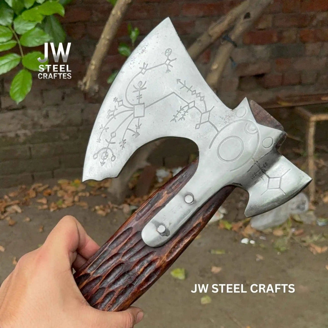 Dune-themed Norse battle axe with decorative engraved blade and textured dark wooden handle on rustic wood background.
