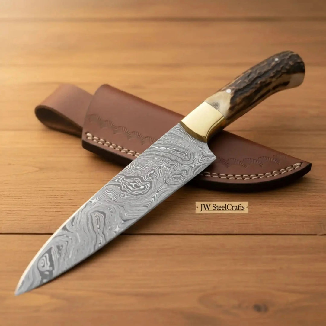 Custom Damascus Clip Point Hunting Knife Decorative Knife With A Brown Leather Sheath On A Wooden Surface