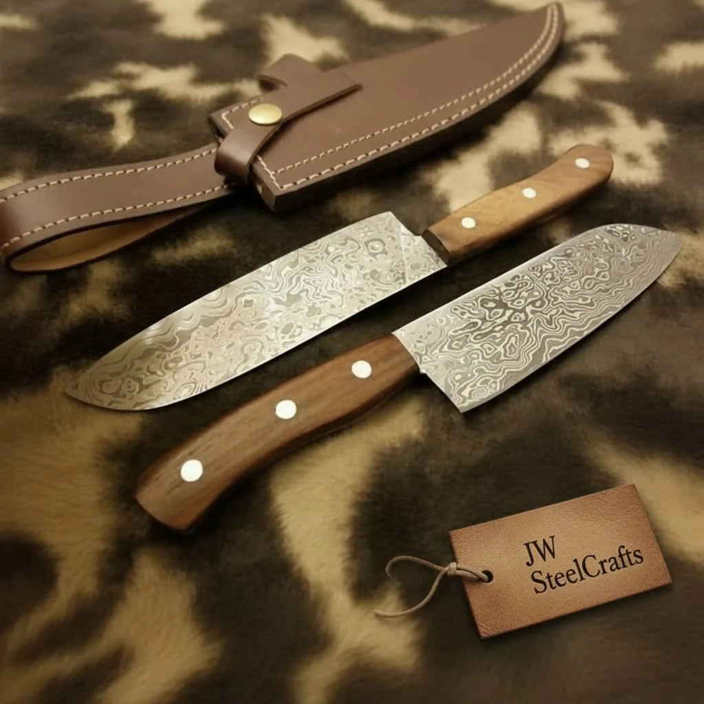Dual Damascus blades with wood handles arranged beside a stitched protective sheath