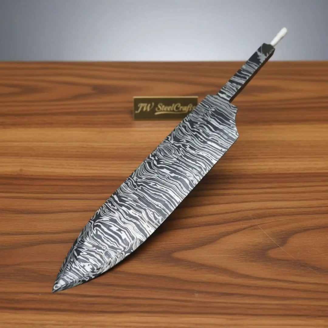 Decorative knife with a damascus pattern on a wooden surface, branded &