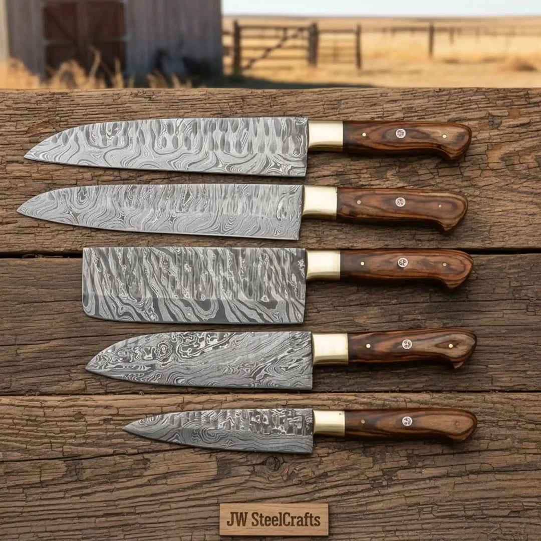 Handmade kitchen knives crafted from Damascus steel with polished wooden handles.