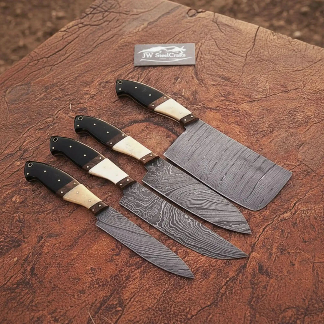 Elite Damascus chef knife series with decorative steel artistry and handcrafted black-and-ivory handles.

