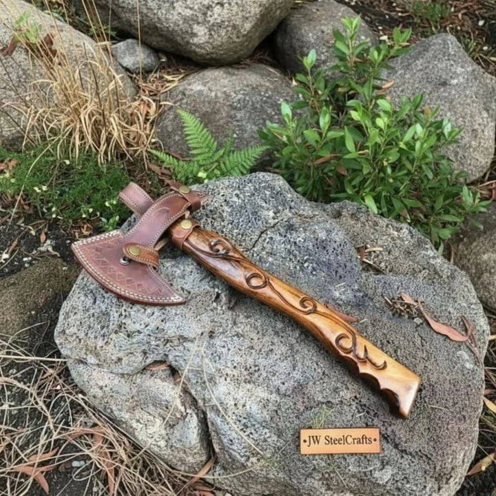     Artisan-crafted Damascus camping axe with decorative hardwood handle and rugged bushcraft styling