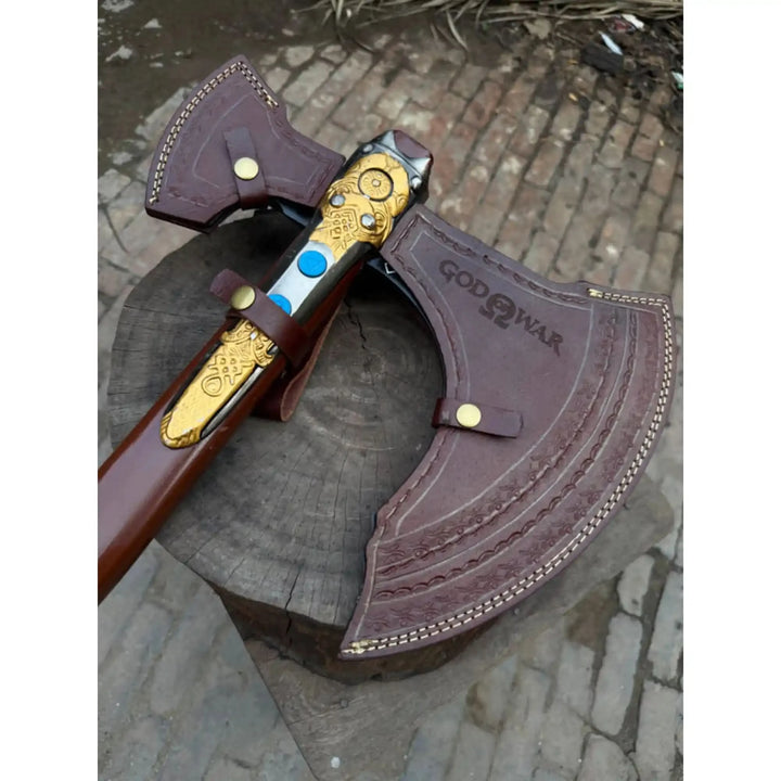 Fantasy-inspired Viking battle axe with etched runic symbols and handcrafted decorative metal details.
