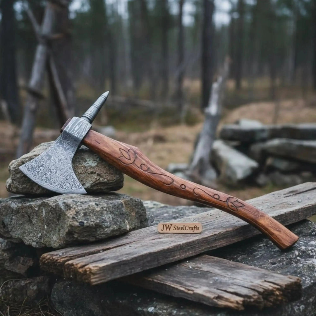 Cedar-inspired Viking rustic tool showcasing patterned steel craftsmanship and woodland outdoor presentation.