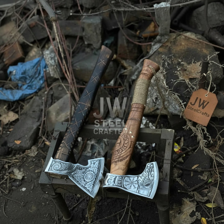 Ember-themed Viking battle weapon collection featuring decorative steel engravings and rustic wood textures.