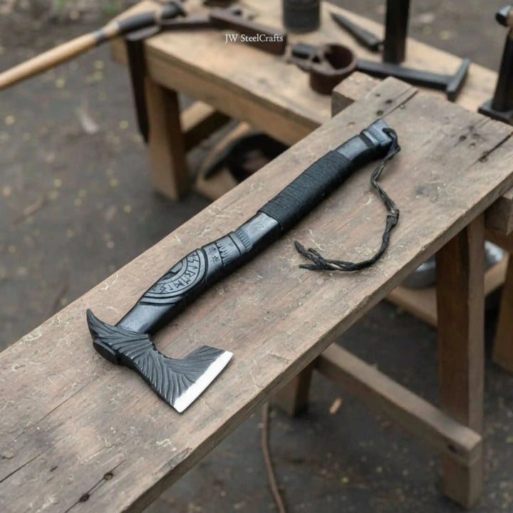 Hearthstone-themed Nordic battle tool showcasing intricate engravings and compact survival hatchet craftsmanship outdoors.