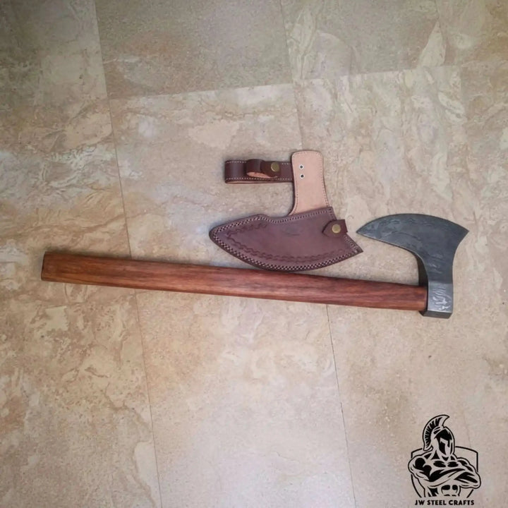 Falconshade-themed Norse war weapon featuring handcrafted Damascus steel axe head and premium hardwood craftsmanship.